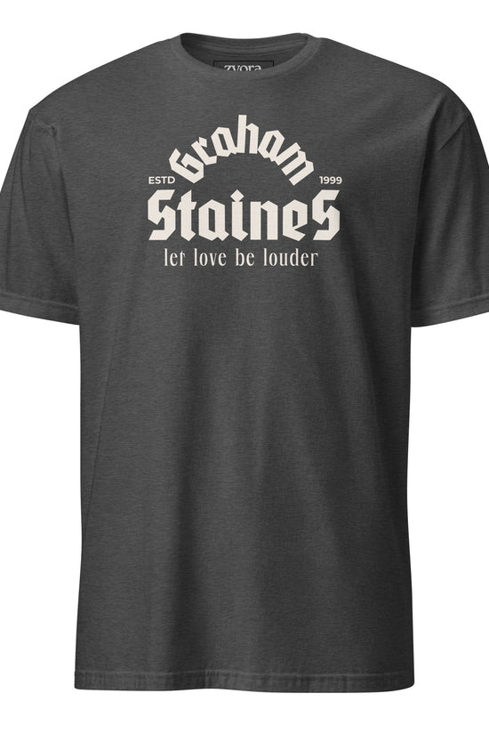 “Graham Staines – Let Love Be Louder” Christian Heather Grey graphic tee, inspired by 1 Corinthians 13:13. Faith-based gift, scripture-inspired apparel for men and women.