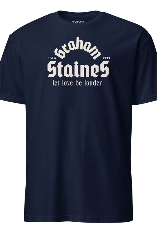 Graham Staines – Let Love Be Louder” Christian Navy graphic tee, inspired by 1 Corinthians 13:13. Faith-based gift, scripture-inspired apparel for men and women.