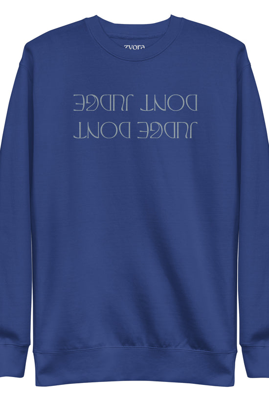 Embroidered unisex premium Christian sweatshirt with “Don’t Judge” design – faith-based fashion and gift by Zyora Apparel.