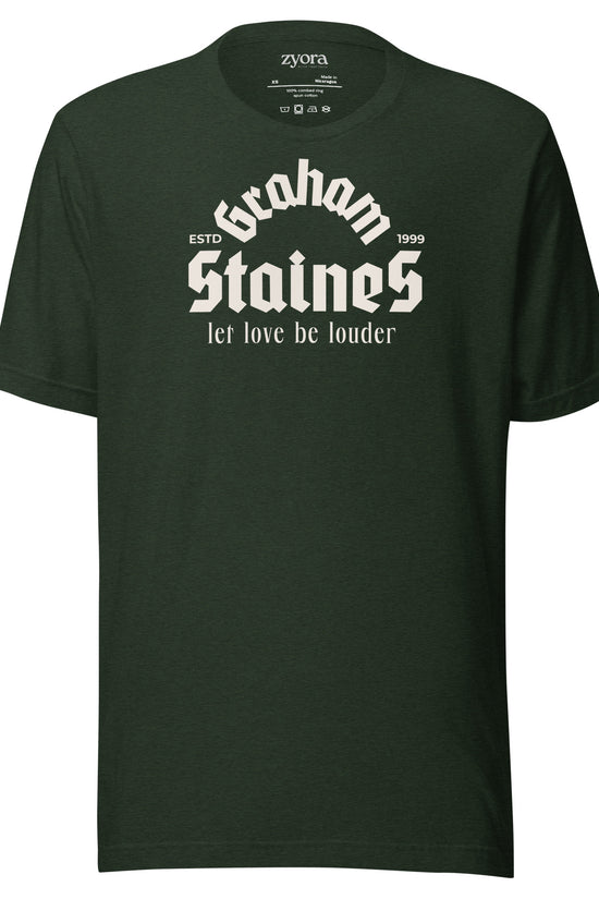 “Graham Staines – Let Love Be Louder” Christian Heather Emerald graphic tee, inspired by 1 Corinthians 13:13. Faith-based gift, scripture-inspired apparel for men and women.