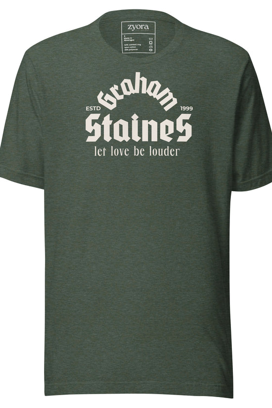 “Graham Staines – Let Love Be Louder” Christian Forest Heather graphic tee, inspired by 1 Corinthians 13:13. Faith-based gift, scripture-inspired apparel for men and women.