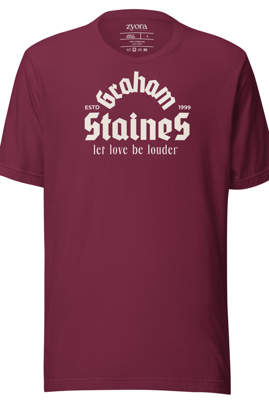 “Graham Staines – Let Love Be Louder” Christian Maroon graphic tee, inspired by 1 Corinthians 13:13. Faith-based gift, scripture-inspired apparel for men and women.